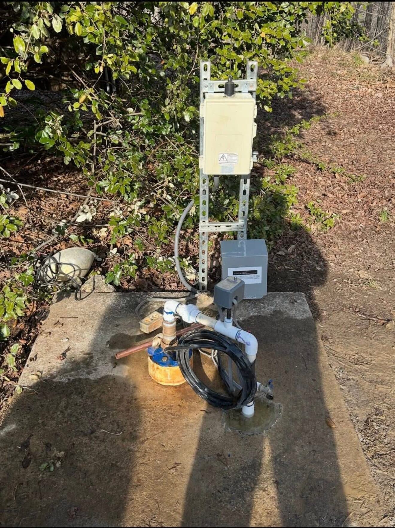 Outdoor well pump control pad and pressure switch installed by A2Z in Huntsville, AL
