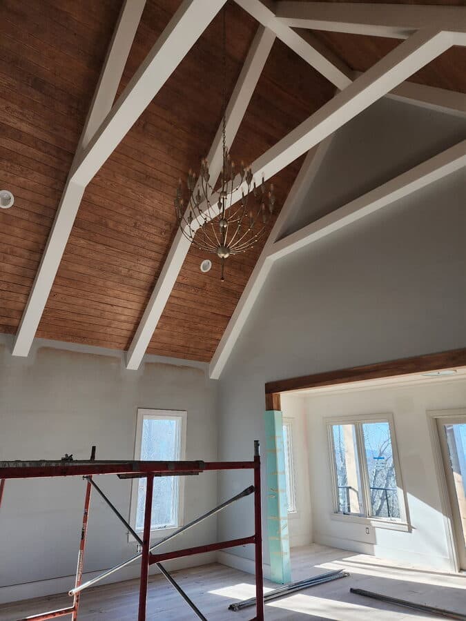 Chandelier installation on vaulted ceiling by A2Z Plumbing, Gas and Electric in a Huntsville, AL home